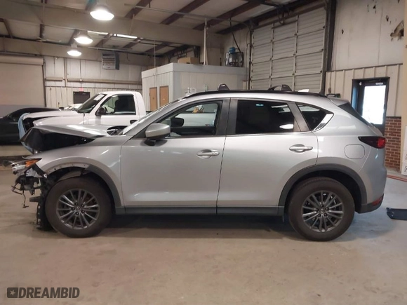 2019 Mazda CX-5 Touring with VIN JM3KFACM7K1551252, listed as a IAAI auction lot 41580918 with NaN miles. Bid and sale history available at carsss.com. Image 14.