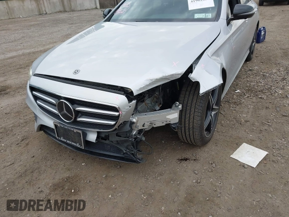 2018 Mercedes-Benz E with VIN WDDZF4KBXJA437064, listed as a IAAI auction lot 41902236 with 47,657 mi miles. Bid and sale history available at carsss.com. Image 6.