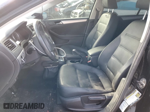 2012 Volkswagen Jetta TDI w/Premium with VIN 3VWLL7AJ2CM088505, listed as a Copart auction lot 88690415 with 106,623 mi miles and Salvage title. Bid and sale history available at DreamBid. Image 7.