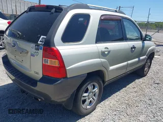 2005 Kia Sportage LX with VIN KNDJF723457060171, listed as a IAAI auction lot 42059269 with 189,461 mi miles and . Bid and sale history available at carsss.com. Image 4.