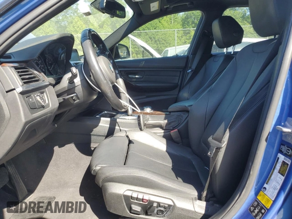 2015 BMW 3 Series 335i xDrive with VIN WBA3B9C53FP705486, listed as a Copart auction lot 57719445 with 76,148 mi miles and Salvage title. Bid and sale history available at DreamBid. Image 7.