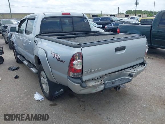 2009 Toyota Tacoma with VIN 3TMLU42N69M032320, listed as a IAAI auction lot 42280196 with 214,720 mi miles and . Bid and sale history available at DreamBid. Image 3.
