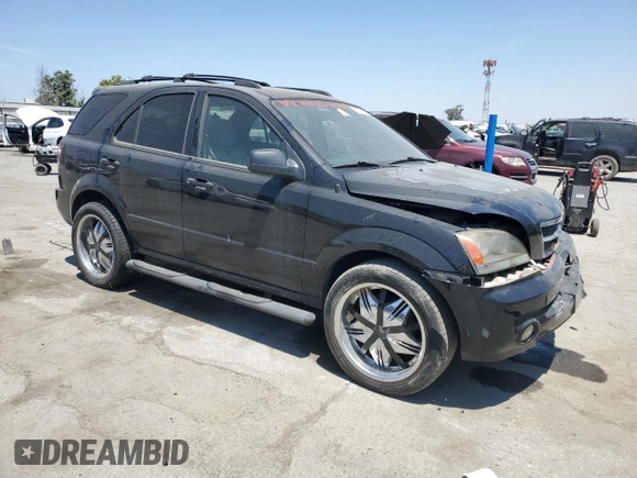 2006 Kia Sorento LX with VIN KNDJD733365525072, listed as a Copart auction lot 60260835 with 128,572 mi miles and Salvage title. Bid and sale history available at DreamBid. Image 4.