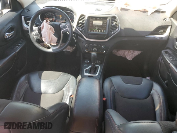 2015 Jeep Cherokee Trailhawk with VIN 1C4PJMBS0FW705288, listed as a Copart auction lot 61796275 with 133,874 mi miles and Salvage title. Bid and sale history available at DreamBid. Image 8.