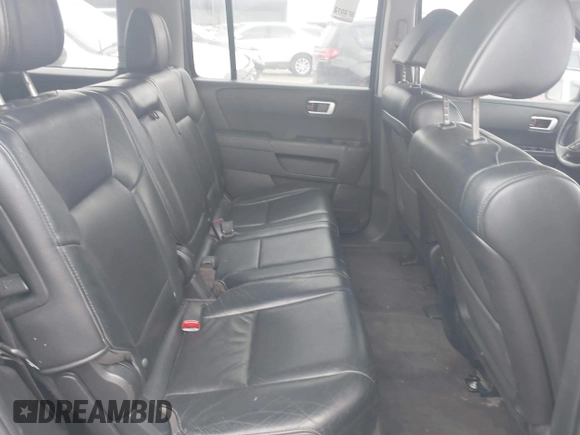 2012 Honda Pilot EX-L with VIN 5FNYF3H53CB033227, listed as a IAAI auction lot 42172444 with 202,420 mi miles. Bid and sale history available at carsss.com. Image 8.