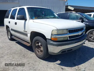 2001 Chevrolet Tahoe LT z VIN 1GNEC13TX1R172937, wystawiony jako IAAI lot #42199690 z przebiegiem 256 923 mil mil oraz . Historia ofert i sprzedaży dostępna na DreamBid. Obrazek 1.