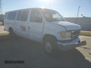 2002 Ford Econoline Passenger XL with VIN 1FBSS31S82HB36096, listed as a Copart auction lot 80654574 with 170,656 mi miles and Salvage title. Bid and sale history available at DreamBid. Image 4.