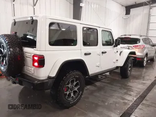 2022 Jeep Wrangler Unlimited Rubicon z VIN 1C4HJXFG7NW106446, wystawiony jako IAAI lot #41405202 z przebiegiem 39 755 mil mil oraz . Historia ofert i sprzedaży dostępna na DreamBid. Obrazek 4.