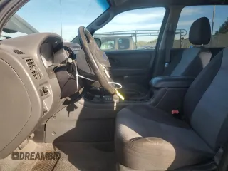 2006 Ford Escape XLS with VIN 1FMYU02Z56KA40201, listed as a Copart auction lot 82932994 with 178,430 mi miles and Salvage Title. Bid and sale history available at carsss.com. Image 7.