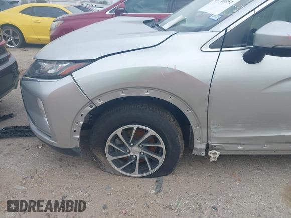 2020 Mitsubishi Eclipse Cross ES z VIN JA4AS3AA4LZ009432, wystawiony jako IAAI lot #41740151 z przebiegiem 75 512 mil mil oraz . Historia ofert i sprzedaży dostępna na DreamBid. Obrazek 16.