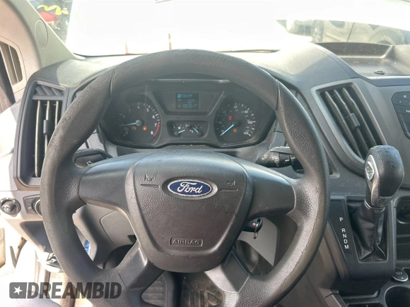 2016 Ford Transit Cargo with VIN 1FTYE1YM2GKB48795, listed as a IAAI auction lot 42854425 with 198,381 mi miles and . Bid and sale history available at DreamBid. Image 17.