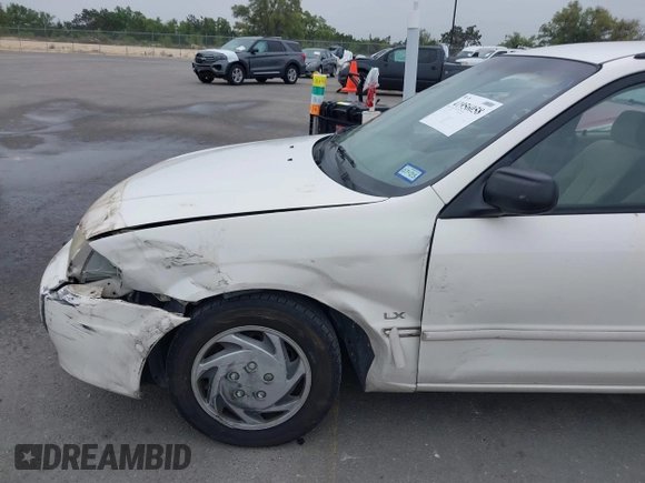 2000 Mazda Protege DX with VIN JM1BJ2220Y0273953, listed as a IAAI auction lot 41956058 with 158,837 mi miles and . Bid and sale history available at DreamBid. Image 6.