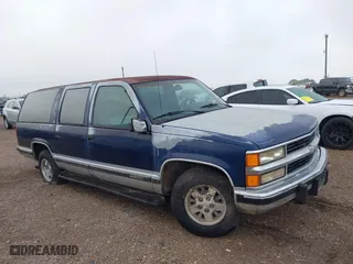 1994 Chevrolet Suburban with VIN 1GNEC16K3RJ360549, listed as a IAAI auction lot 42080890 with 126,804 mi miles. Bid and sale history available at carsss.com. Image 6.