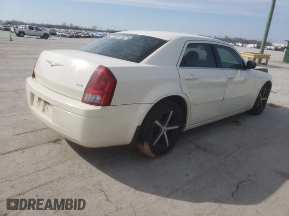 2005 Chrysler 300 with VIN 2C3JA43R25H663094, listed as a Copart auction lot 60813664 with 218,830 mi miles and Salvage Title. Bid and sale history available at carsss.com. Image 3.