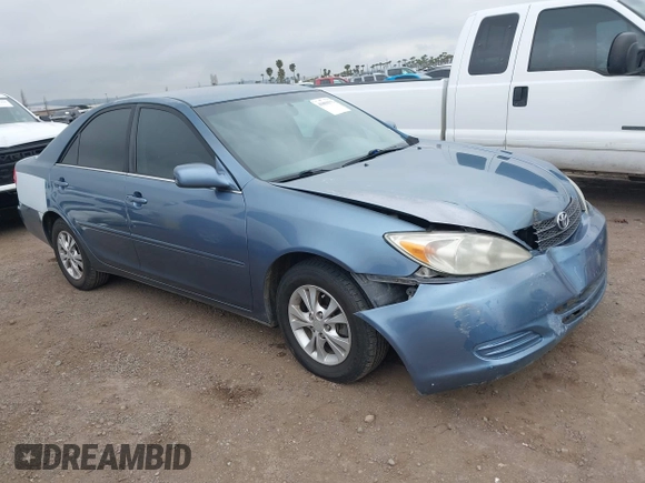 2004 Toyota Camry LE with VIN 4T1BF32K54U572537, listed as a IAAI auction lot 41850322 with 167,076 mi miles and . Bid and sale history available at DreamBid. Image 1.