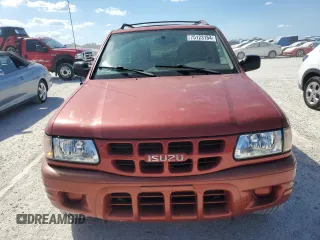 2001 Isuzu Rodeo S z VIN 4S2CK58W414317422, wystawiony jako Copart lot #75123154 z przebiegiem Nie podano mil oraz Szkody całkowita. Historia ofert i sprzedaży dostępna na DreamBid. Obrazek 5.