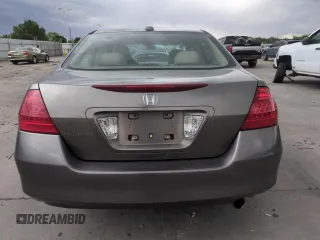 2006 Honda Accord EX-L z VIN 1HGCM56866A047744, wystawiony jako Copart lot #57266065 z przebiegiem 263 618 mil mil oraz Szkoda całkowita • Salvage title. Historia ofert i sprzedaży dostępna na DreamBid. Obrazek 6.