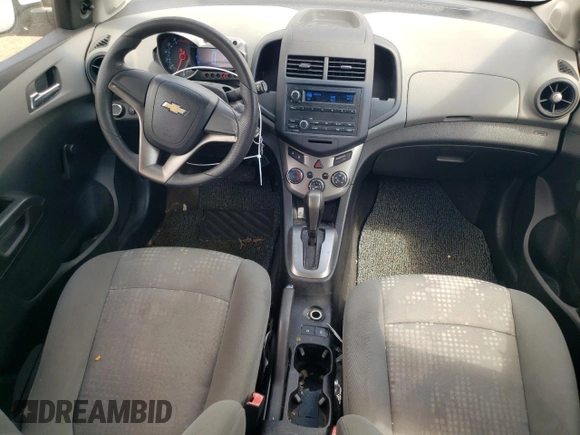 2012 Chevrolet Sonic LS z VIN 1G1JA6SH1C4162605, wystawiony jako Copart lot #88037145 z przebiegiem 117 164 mil mil oraz Nie do naprawy • Non repairable. Historia ofert i sprzedaży dostępna na DreamBid. Obrazek 8.