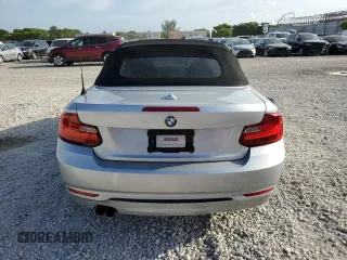 2016 BMW 2 Series 228i with VIN WBA1K9C57GV321957, listed as a Copart auction lot 59200583 with 65,761 mi miles. Bid and sale history available at carsss.com. Image 6.