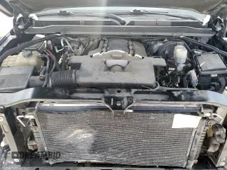 2018 Cadillac Escalade z VIN 1GYS3AKJ6JR256100, wystawiony jako Copart lot #57900755 z przebiegiem 129 775 mil mil oraz Szkoda całkowita • Salvage title. Historia ofert i sprzedaży dostępna na DreamBid. Obrazek 12.