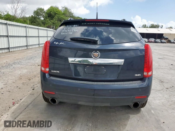 2014 Cadillac SRX Performance Collection с VIN 3GYFNCE34ES580069, выставлен на аукционе Copart как лот 60662415 с пробегом 141 107 миль миль и Списание • Salvage title. История ставок и продаж доступна на DreamBid. Изображение 6.