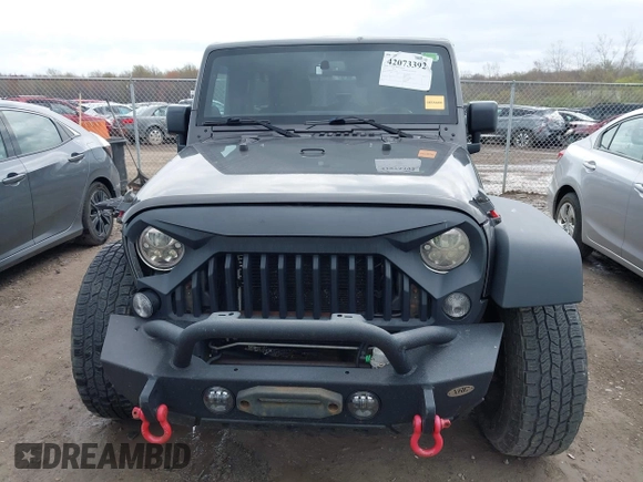2014 Jeep Wrangler Unlimited Sport with VIN 1C4BJWDG6EL239378, listed as a IAAI auction lot 42073392 with 120,999 mi miles. Bid and sale history available at carsss.com. Image 13.