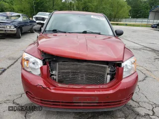 2010 Dodge Caliber SXT z VIN 1B3CB4HA3AD613799, wystawiony jako Copart lot #57339675 z przebiegiem 221 841 mil mil oraz Szkoda całkowita • Salvage title. Historia ofert i sprzedaży dostępna na DreamBid. Obrazek 5.