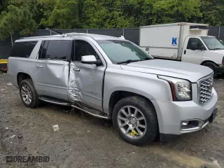 2020 GMC Yukon XL Denali with VIN 1GKS1HKJ9LR200101, listed as a Copart auction lot 73493014 with 111,304 mi miles and Salvage Title. Bid and sale history available at carsss.com. Image 4.