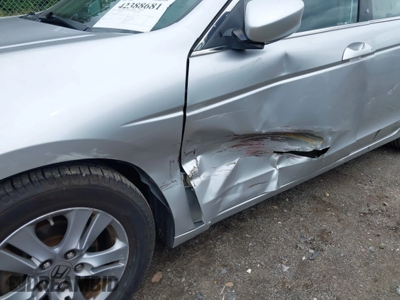 2012 Honda Accord SE z VIN 1HGCP2F61CA120373, wystawiony jako IAAI lot #42388681 z przebiegiem 121 754 mil mil oraz . Historia ofert i sprzedaży dostępna na DreamBid. Obrazek 6.