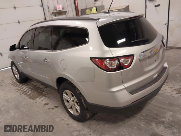 2014 Chevrolet Traverse LT with VIN 1GNKRGKD9EJ149541, listed as a IAAI auction lot 41945942 with 186,531 mi miles. Bid and sale history available at carsss.com. Image 3.