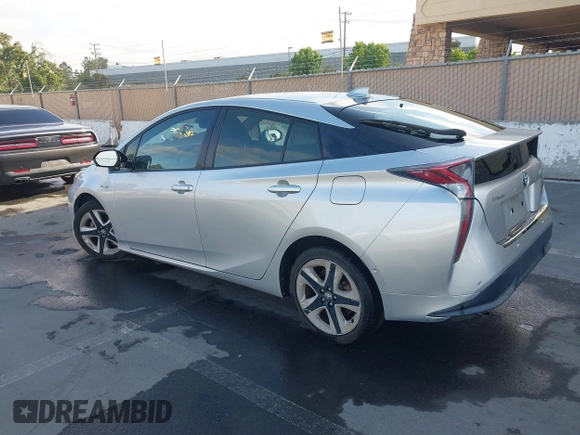 2016 Toyota Prius Four with VIN JTDKARFU1G3004619, listed as a IAAI auction lot 42432730 with 93,471 mi miles and . Bid and sale history available at DreamBid. Image 3.