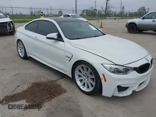 2015 BMW M4 z VIN WBS3R9C54FK329174, wystawiony jako IAAI lot #41923136 z przebiegiem 54 379 mil mil oraz . Historia ofert i sprzedaży dostępna na DreamBid. Obrazek 1.