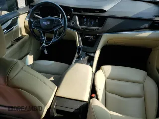 2017 Cadillac XT5 FWD with VIN 1GYKNARS0HZ283618, listed as a Copart auction lot 61640005 with 113,823 mi miles and Salvage title. Bid and sale history available at DreamBid. Image 8.