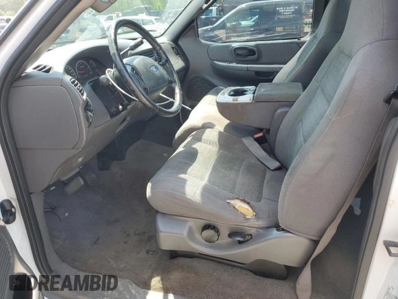 2003 Ford F-150 XL with VIN 1FTRF17W83NA54398, listed as a Copart auction lot 58680304 with 164,874 mi miles and Salvage Title. Bid and sale history available at DreamBid. Image 7.