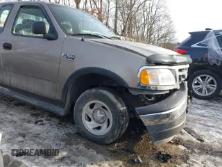 2003 Ford F-150 XL with VIN 2FTRX18W73CB07559, listed as a IAAI auction lot 41452402 with 152,509 mi miles. Bid and sale history available at carsss.com. Image 16.
