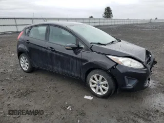 2013 Ford Fiesta SE with VIN 3FADP4EJ5DM119614, listed as a Copart auction lot 48731575 with 64,676 mi miles and Salvage Title. Bid and sale history available at carsss.com. Image 4.