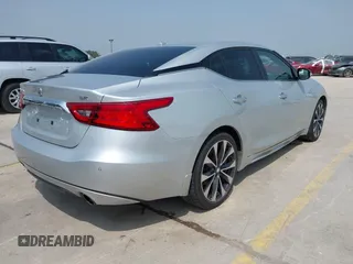 2017 Nissan Maxima SR z VIN 1N4AA6AP9HC397126, wystawiony jako IAAI lot #42291477 z przebiegiem 115 201 mil mil oraz . Historia ofert i sprzedaży dostępna na DreamBid. Obrazek 4.
