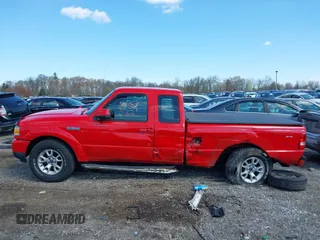2011 Ford Ranger XLT with VIN 1FTLR4FE5BPA57057, listed as a IAAI auction lot 41995162 with 238,987 mi miles. Bid and sale history available at carsss.com. Image 14.
