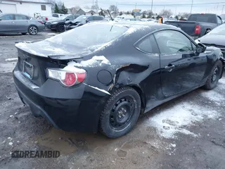 2013 Subaru BRZ Limited with VIN JF1ZCAC10D1610771, listed as a IAAI auction lot 41146845 with 68,136 mi miles. Bid and sale history available at carsss.com. Image 4.