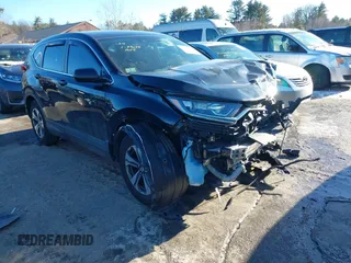 2020 Honda CR-V LX with VIN 2HKRW2H26LH653866, listed as a IAAI auction lot 41470018 with 63,086 mi miles. Bid and sale history available at carsss.com. Image 1.
