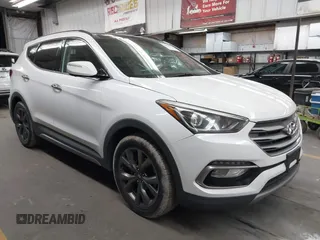 2017 Hyundai Santa Fe Ultimate with VIN 5NMZW4LA0HH040141, listed as a IAAI auction lot 42603243 with 140,817 mi miles and . Bid and sale history available at DreamBid. Image 1.
