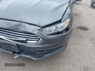 2017 Ford Fusion Hybrid SE with VIN 3FA6P0LU2HR301083, listed as a IAAI auction lot 42602798 with 89,003 mi miles and . Bid and sale history available at DreamBid. Image 6.