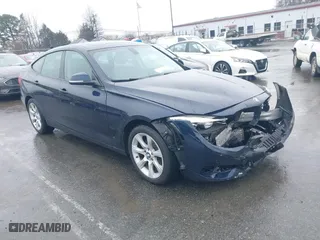 2015 BMW 3 Series Gran Turismo 328i xDrive with VIN WBA3X5C5XFD562161, listed as a IAAI auction lot 41570204 with 71,405 mi miles. Bid and sale history available at carsss.com. Image 1.