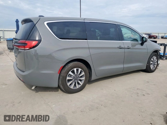 2023 Chrysler Pacifica Hybrid Touring L with VIN 2C4RC1L72PR614075, listed as a Copart auction lot 58586115 with 43,960 mi miles and Salvage title. Bid and sale history available at DreamBid. Image 3.