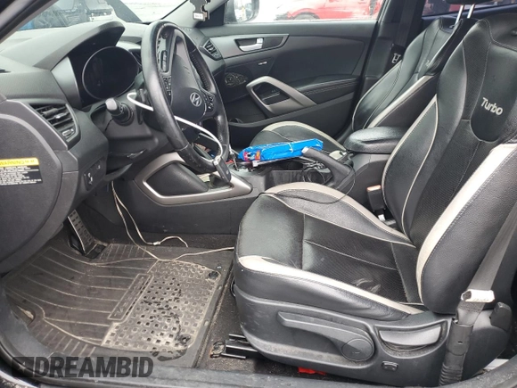 2013 Hyundai Veloster Turbo z VIN KMHTC6AE4DU155792, wystawiony jako Copart lot #83189014 z przebiegiem 70 033 mil mil oraz Szkoda całkowita • Salvage title. Historia ofert i sprzedaży dostępna na DreamBid. Obrazek 7.
