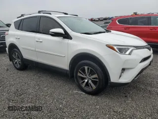 2018 Toyota RAV4 XLE with VIN JTMWFREV3JJ746262, listed as a Copart auction lot 51811035 with 84,319 mi miles and Salvage Title. Bid and sale history available at DreamBid. Image 4.