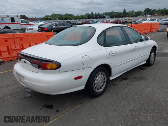 1997 Ford Taurus LX z VIN 1FALP53S0VG291879, wystawiony jako IAAI lot #42498197 z przebiegiem 266 886 mil mil oraz . Historia ofert i sprzedaży dostępna na DreamBid. Obrazek 4.