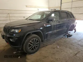 2019 Jeep Grand Cherokee Trailhawk with VIN 1C4RJFLG8KC613582, listed as a Copart auction lot 56102795 with 136,809 mi miles and Salvage title. Bid and sale history available at DreamBid. Image 1.
