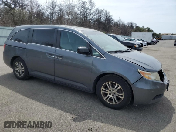 2013 Honda Odyssey EX-L with VIN 5FNRL5H67DB016806, listed as a Copart auction lot 53340445 with 141,067 mi miles and Salvage Title. Bid and sale history available at carsss.com. Image 4.
