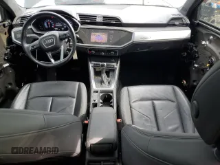 2020 Audi Q3 Premium with VIN WA1AECF30L1025756, listed as a Copart auction lot 50295125 with 77,389 mi miles and Salvage title. Bid and sale history available at DreamBid. Image 8.